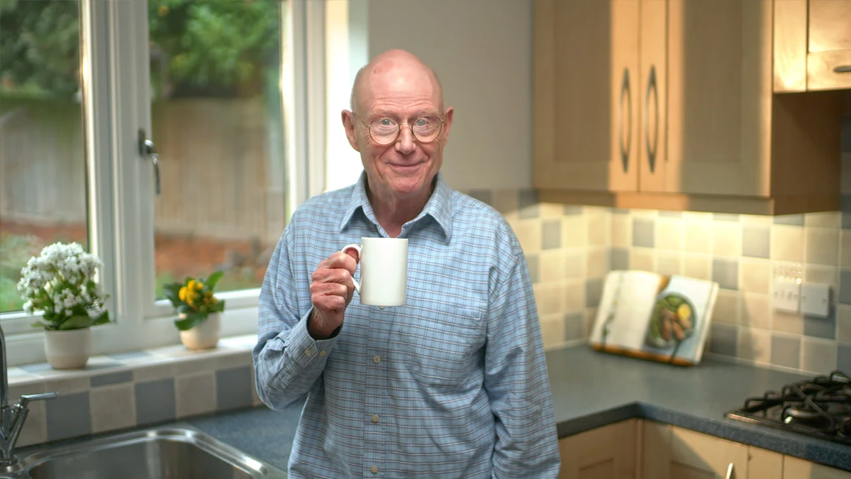 Simplicity Cremations presenter speaking in a warm and reassuring setting